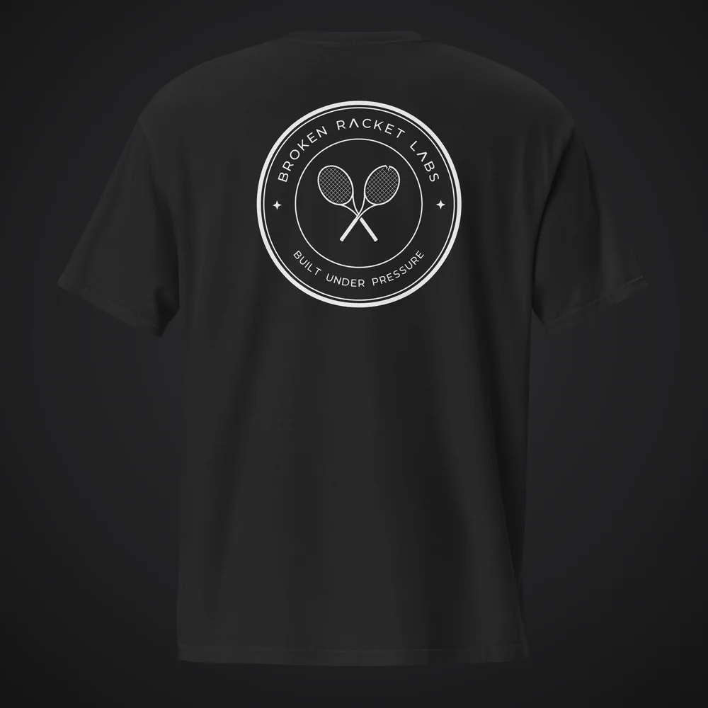 The After Hours Tee in black, back view with the white Broken Racket Labs seal